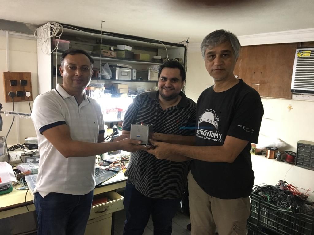 Ashhar Farhan with the AISAT flight unit